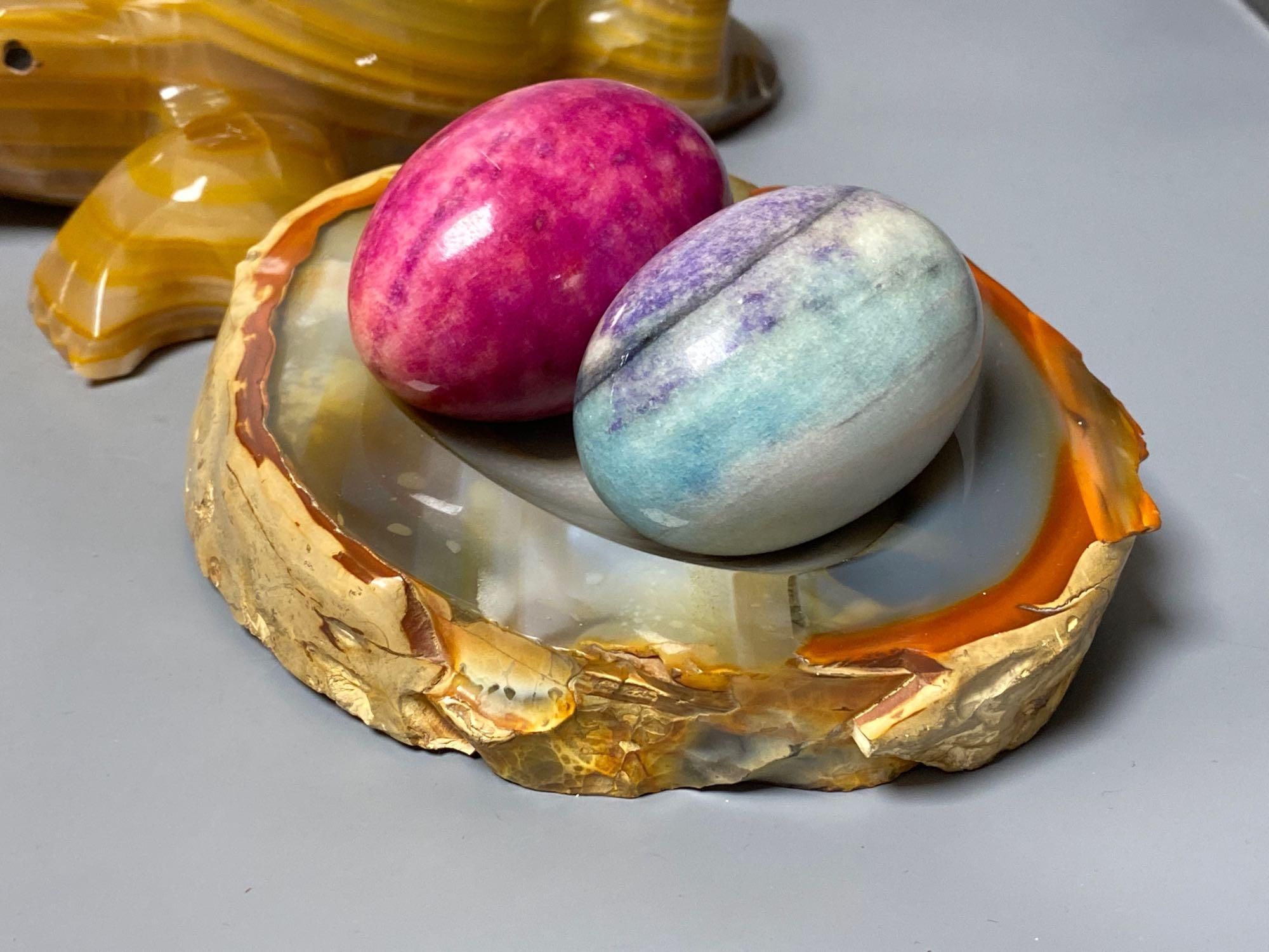 A Shona soapstone dish/duck containing eggs, a turquoise parrot on stand and various hardstone carvings and boxes